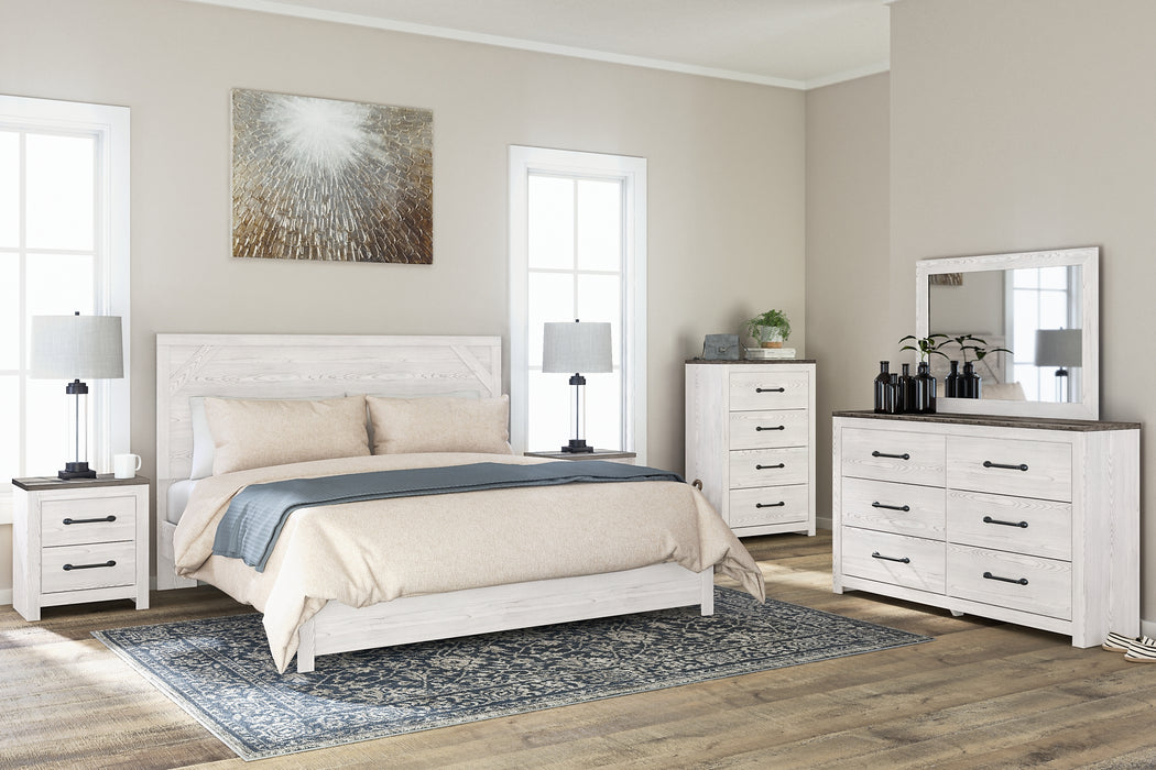 Gerridan King Panel Bed with Mirrored Dresser, Chest and 2 Nightstands