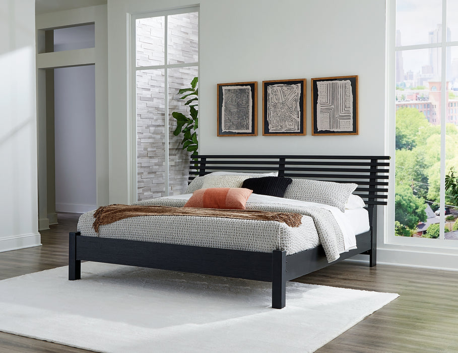 Danziar King Panel Bed with Mirrored Dresser, Chest and Nightstand